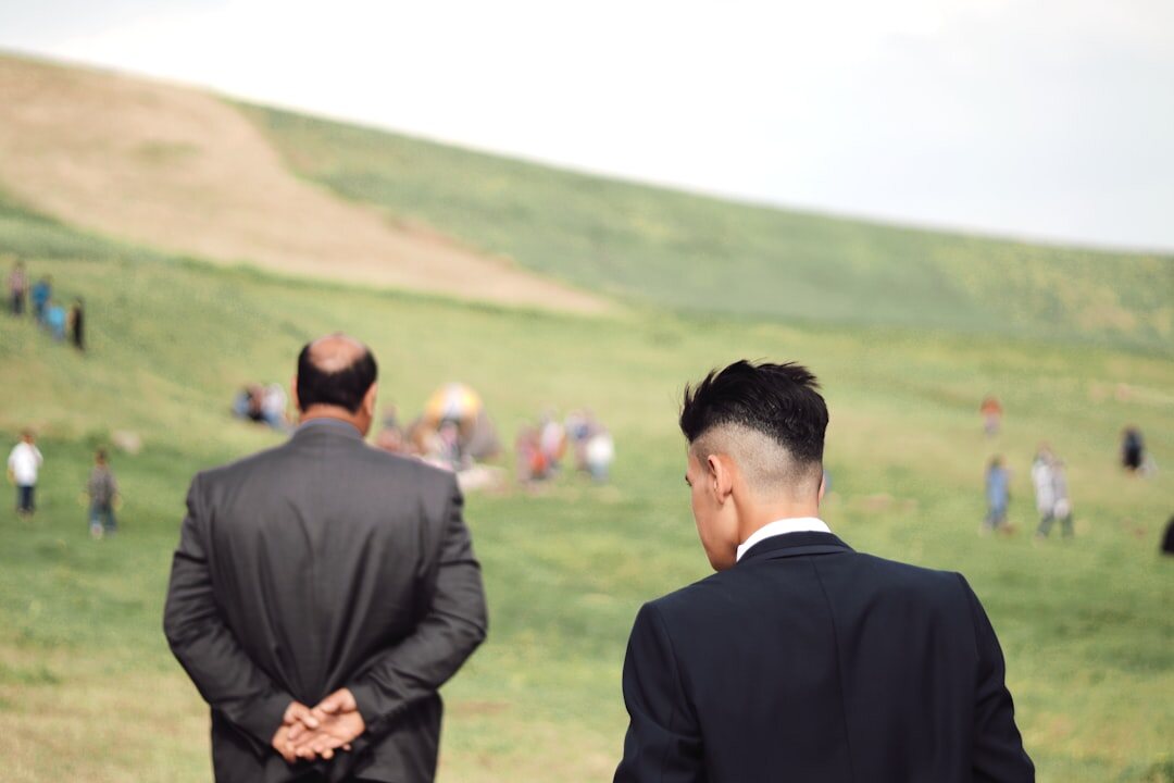 Professionals shaking hands in a modern office during a business meeting