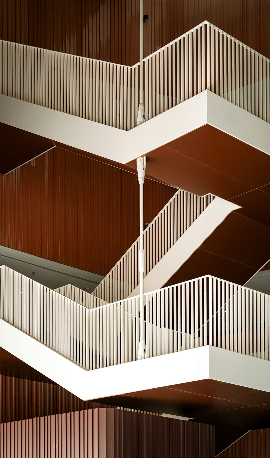 Bright modern office lobby with people walking