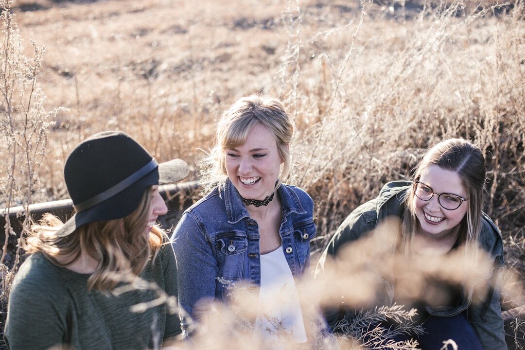 Small group of colleagues talking and laughing together